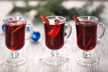 Mulled wine on wooden table