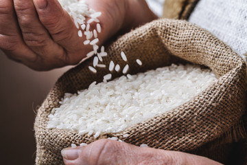 white rice in old hand