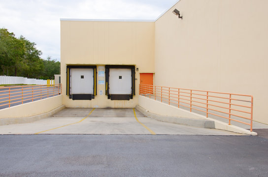 An empty cargo loading dock with two loading slots