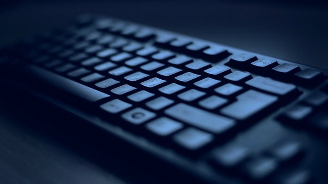 Сlose up computer keyboard. Night theme