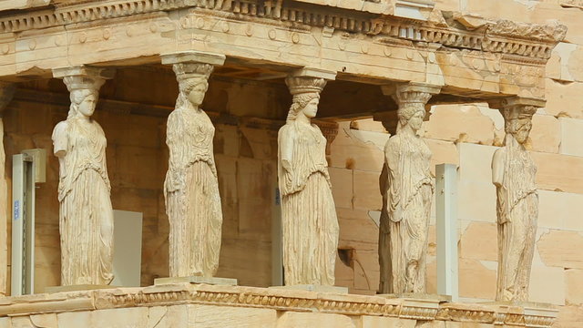 Porch of Caryatids at antique Erechtheion temple in Athens, ancient architecture