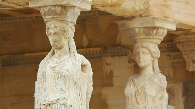 Ancient column supports in form of women, antique sculpture art, architecture