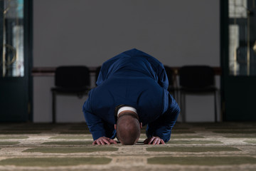 Muslim Businessman Is Praying In The Mosque