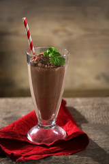 Chocolate cocktail on wooden background