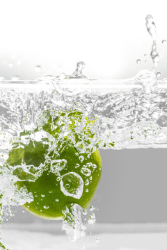 Lime Falling into Water Splash