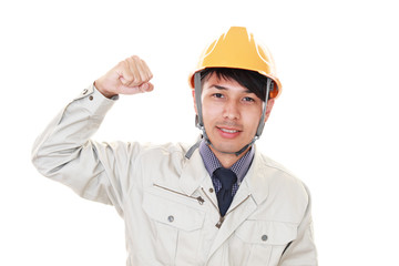 ガッツポーズの労働者