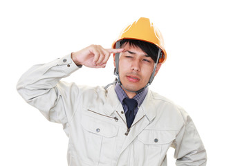 頭痛を訴える労働者