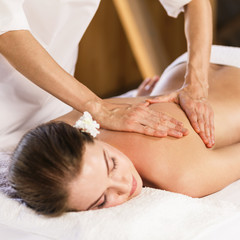 Woman enjoying massage.