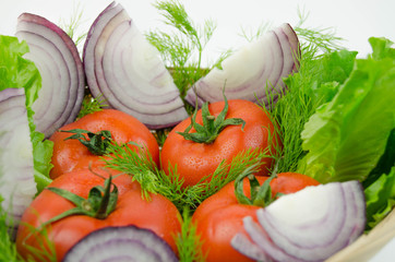 A whole tomato and chopped onion