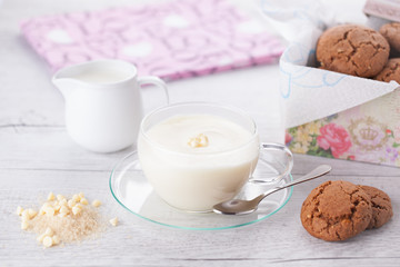 Romantic breakfast with hot white chocolate and cookies
