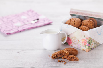 Romantic breakfast with hot white chocolate and cookies