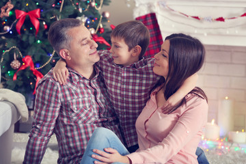 Christmas family portrait in home holiday living room