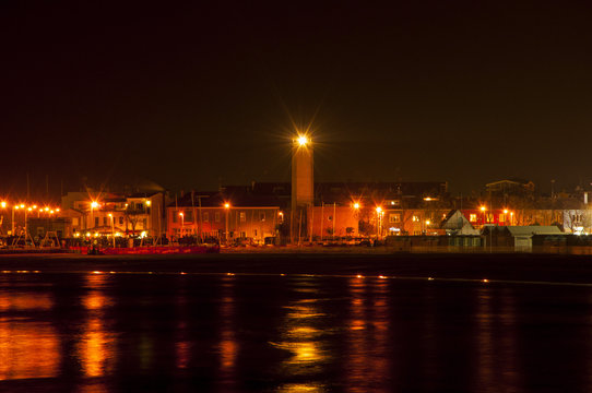 Lighthouse night in fano italy