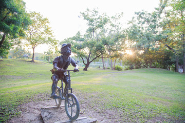 Fototapeta na wymiar Children statue at Vachirabenjatas Park (Rot Fai Park).
