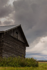 Barn House Under Heavy Clouds