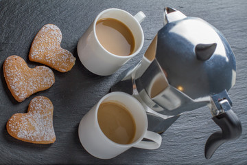 Obraz na płótnie Canvas Coffee and heart shaped cookies