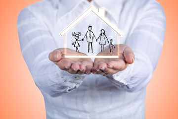 Proprety insurance concept ,Woman holding hands with a drawn family symbol.Family life insurance, family services, family policy concept/