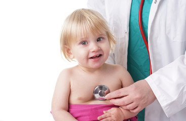 Doctor exams baby girl with stethoscope