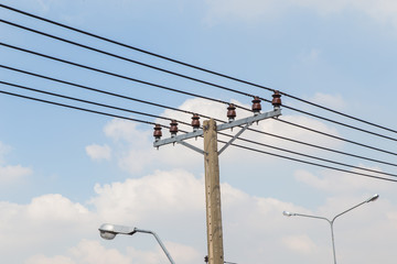 electricity pole on blue sky and white cloud background.