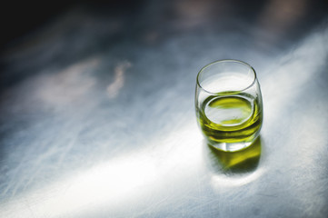 olive oil in a glass