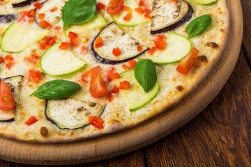 Delicious vegetarian pizza with aubergines and zucchini
