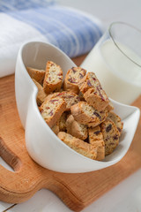Milk and cookies on white background