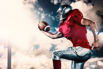 Composite image of side view of american football player running © vectorfusionart