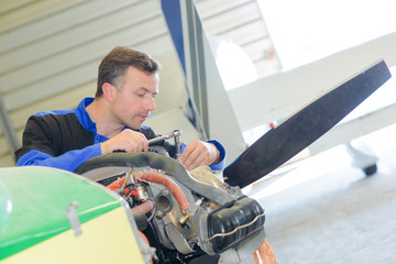Mechanic working on aircraft