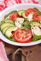 vegetarian salad with tomato,mozza and avocado