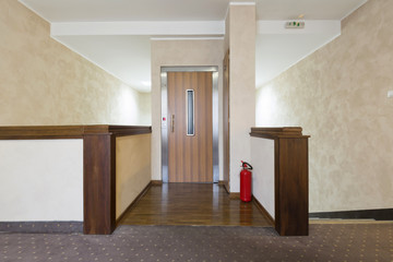 Lobby interior with elevator door