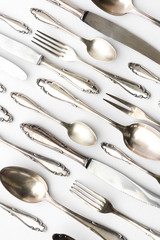   silver cutlery collection on white background