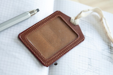 leather luggage tag and notebook pencil for plan journey