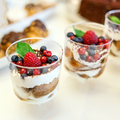 Delicious raspberry and other cakes set for holiday.