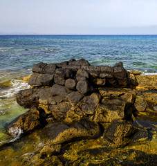 in lanzarote froth coastline  spain pond  rock stone sky cloud b
