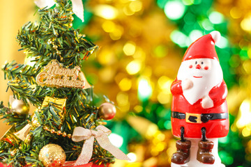 Santa Claus figurine with Christmas tree