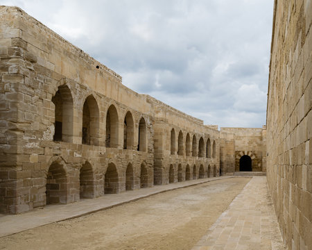 An open court at an old citadel in Alexandria, Egypt. A 15th-century defensive fortress located on the Mediterranean sea coast, established in 1477 AD (882 AH)