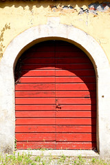 old   door    in italy old ancian wood  red