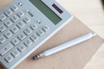 calculator pencil and notebook