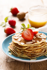 Pancakes with strawberry and almond