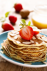 Pancakes with strawberry and almond