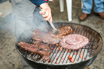 Close-up Of Meat Assortment On Hot BBQ Charcoal Grill