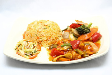 Stair fried chicken with fired rice vegetable and salad