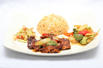 Stair fried beef with fired rice vegetable and salad