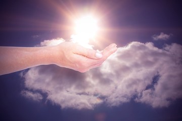 Composite image of hand presenting 