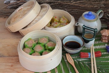 Chinese steamed dumpling and hot tea delicious.