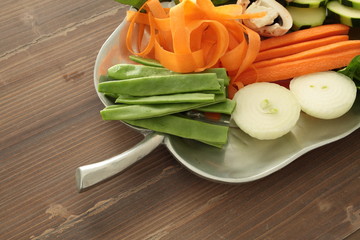 tray with fresh cut vegetables to cook

