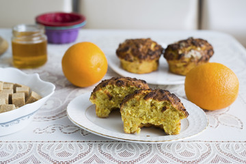 Orange homemade cupcake on the table