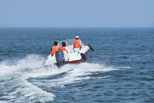Speedboat on speed in blue waves