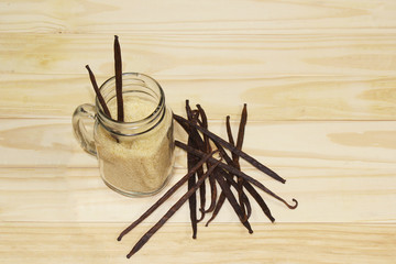 Jar of brown sugar and vanilla pod.