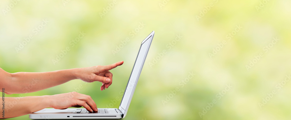 Poster hands with laptop computer.